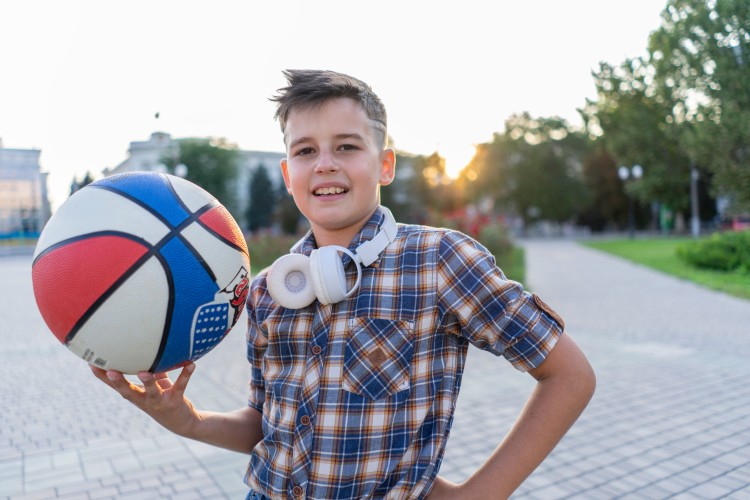 stylish-guy-with-a-basketball-in-his-hand