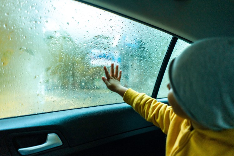 a-child-in-the-car-during-the-rain