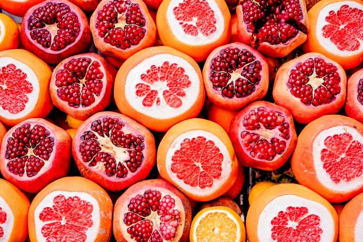 pomegranates-and-citrus-fruits-background