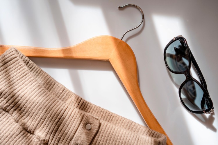 composition-with-apparel-hanger-and-sunglasses
