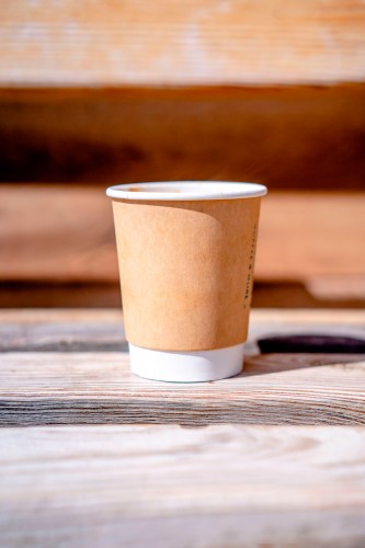 paper-coffee-cup-on-the-wooden-surface