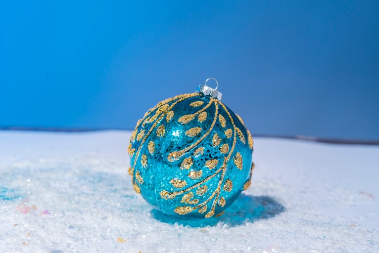 blue-christmas-ball-decorated-with-gold