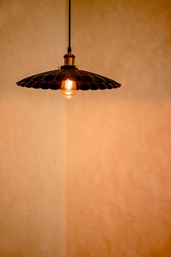 lamp-against-the-brown-wall