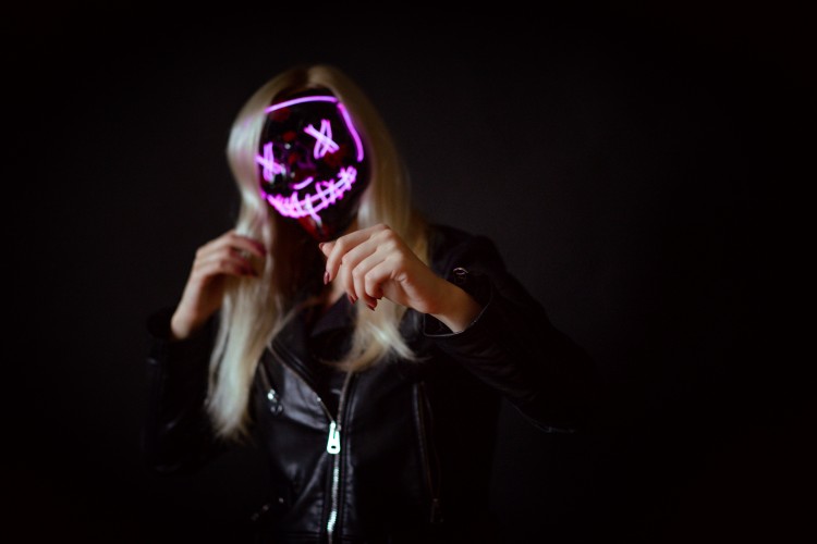 blonde-girl-in-neon-halloween-mask
