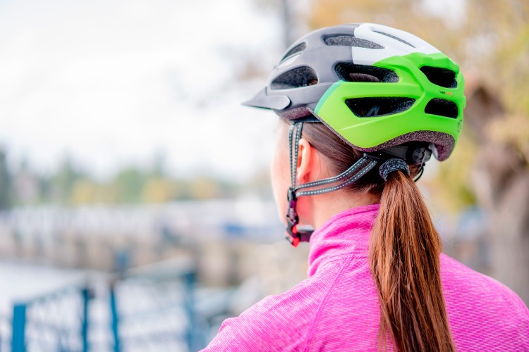 young-girl-with-a-bicycle-helmet-on-her-head