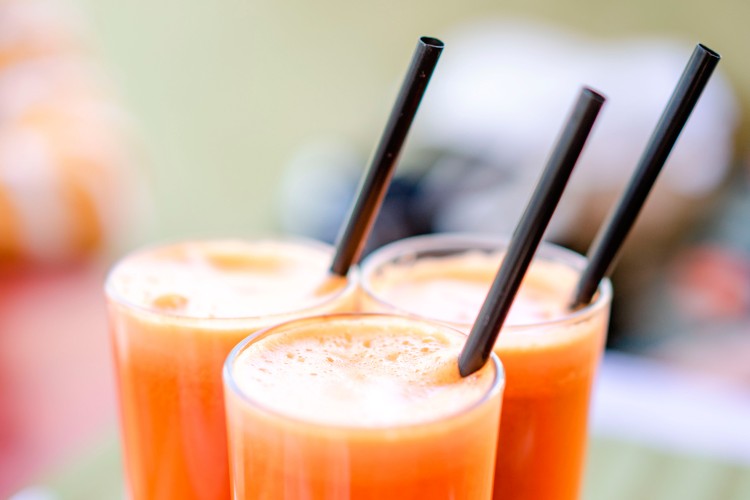 three-juice-glasses-with-straws