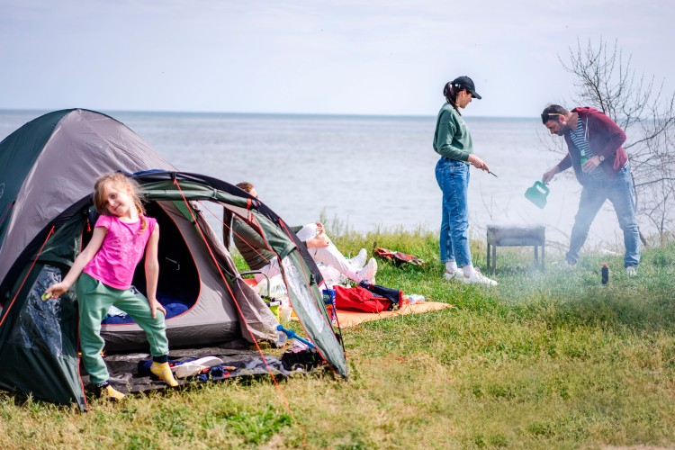 family-vacation-with-river-camping