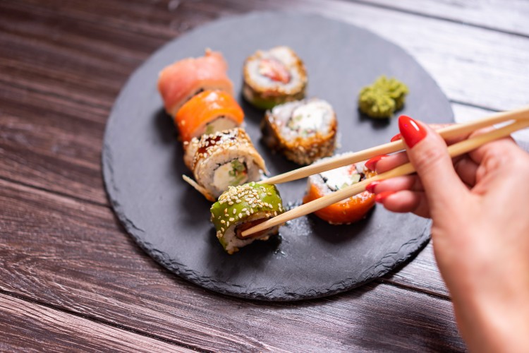 woman-eating-japanese-sushi