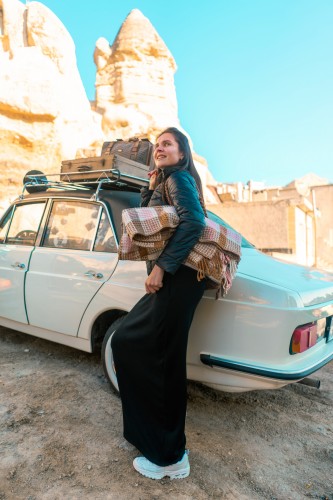 excited-woman-with-blanket-during-travel-around-turkey