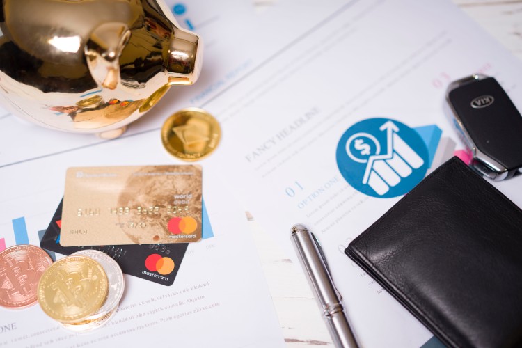 composition-with-business-papers-coins-and-credit-cards