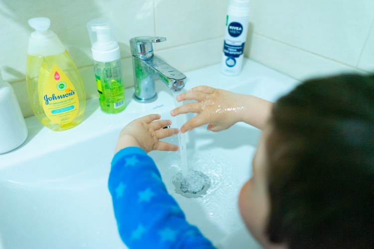 child-washing-hands-at-home