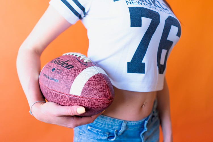 a-cheerleader-with-a-ball-in-her-hands-