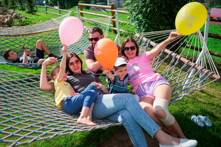 people-chilling-in-the-hammocks-on-a-summer-day