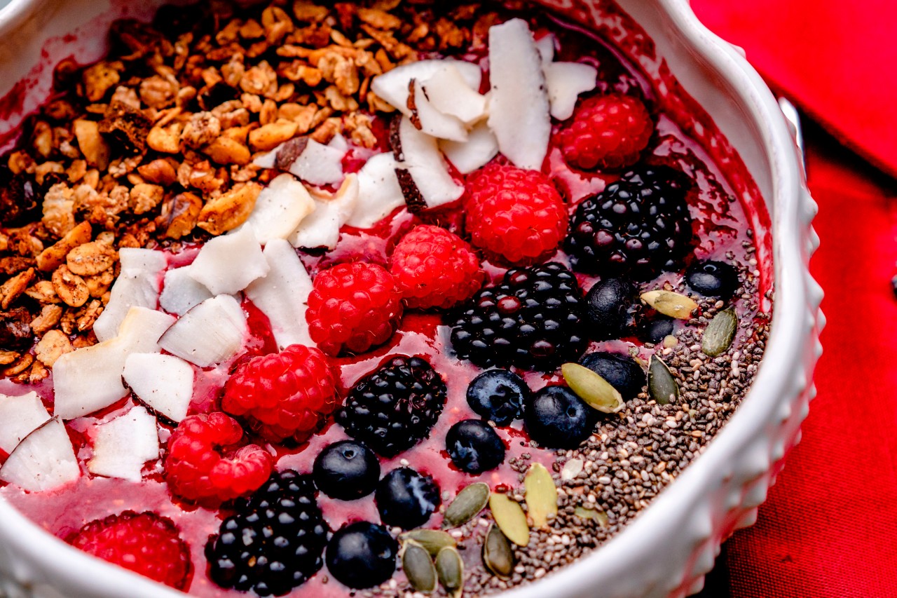 Delicious smoothie bowl with berries and nuts