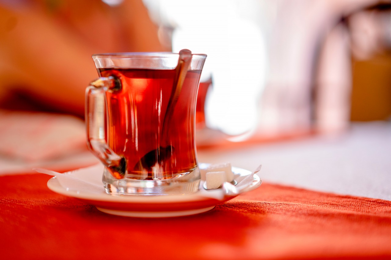 Glass of traditional Turkish tea on the table
