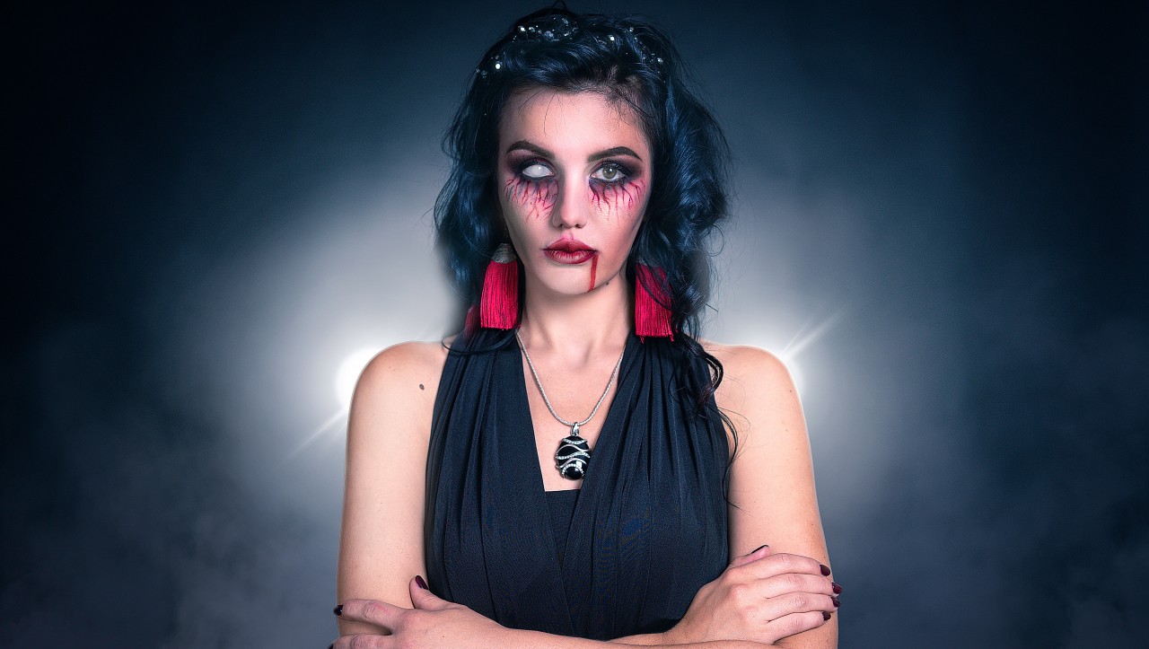A Brunette Woman with Halloween Makeup