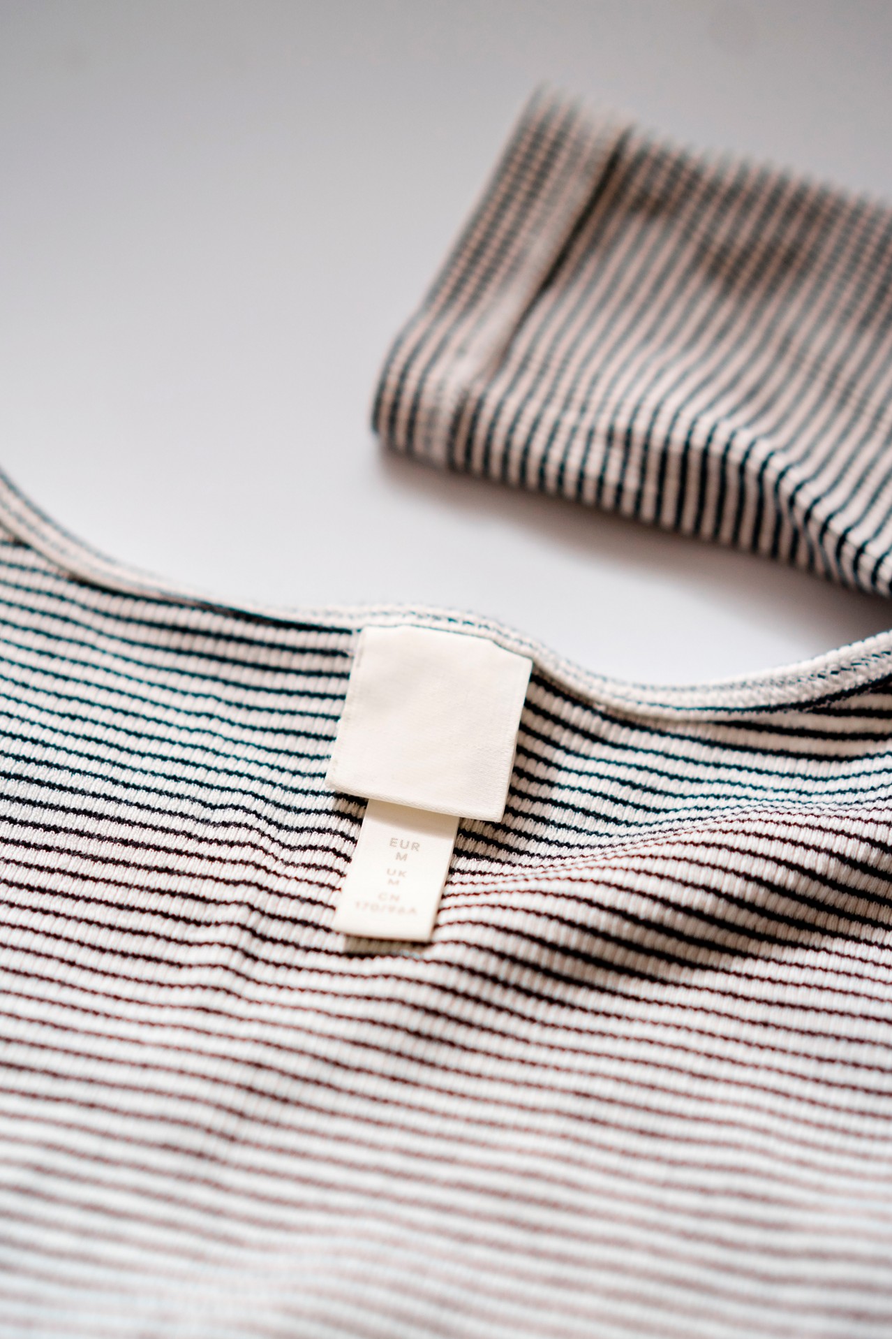 Striped shirt with label tag