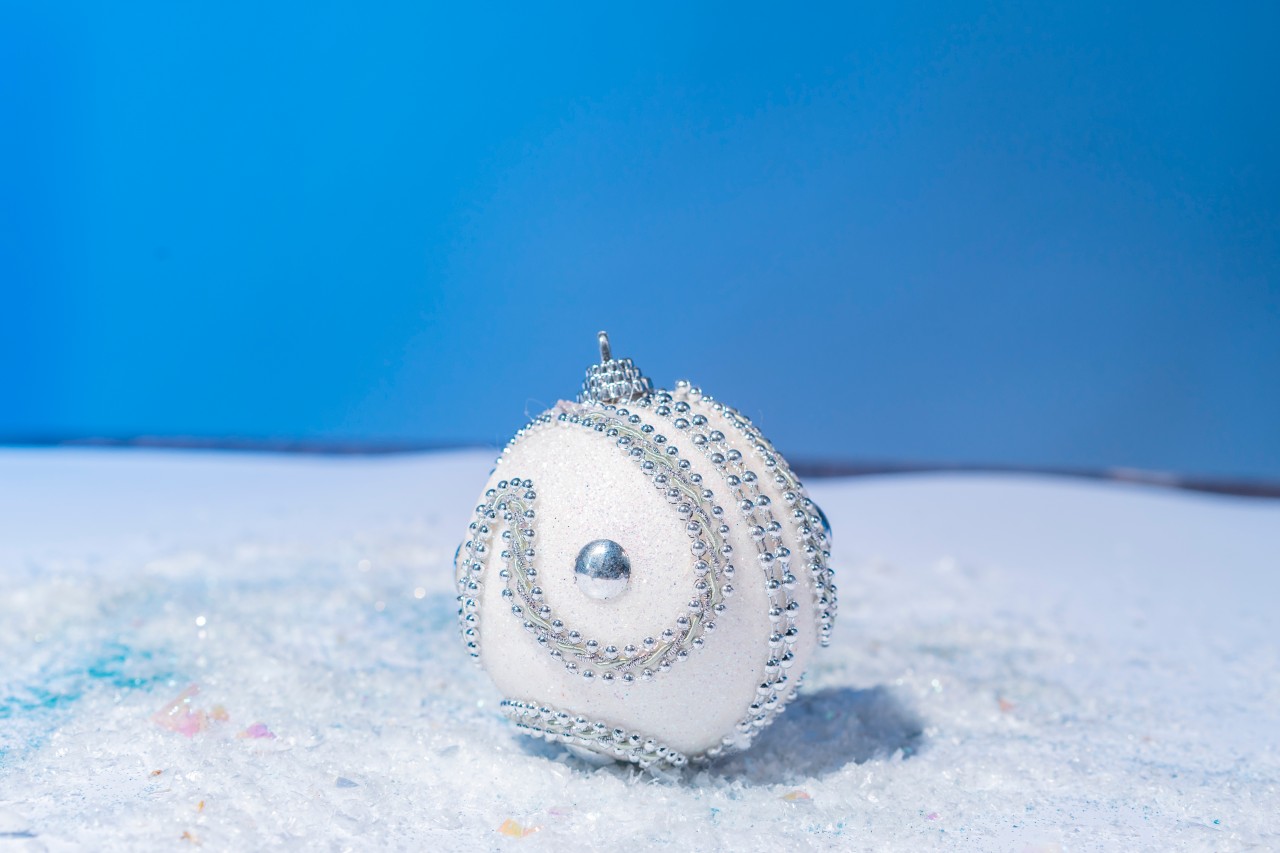 Christmas toy decorated with silver beads
