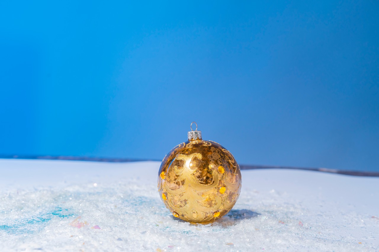 Golden Christmas tree ball decorated with rhinestones