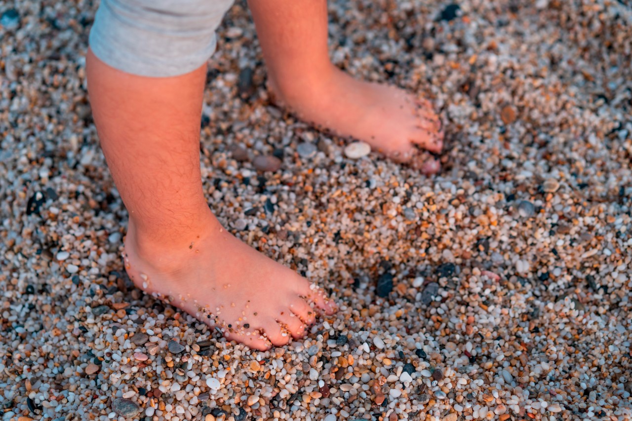 A Child on the Sandy Seashore