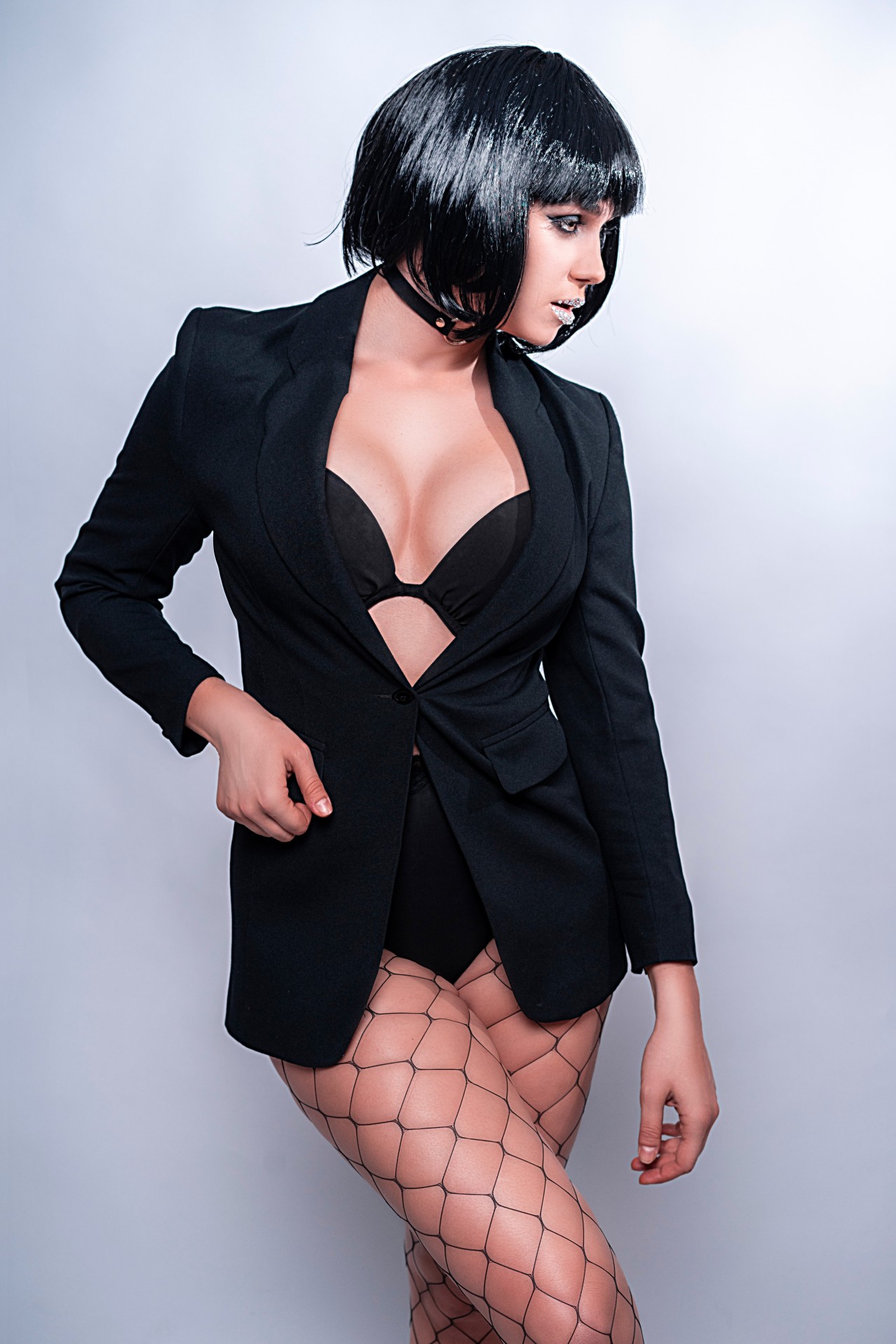 Sexy stylish woman in black wig