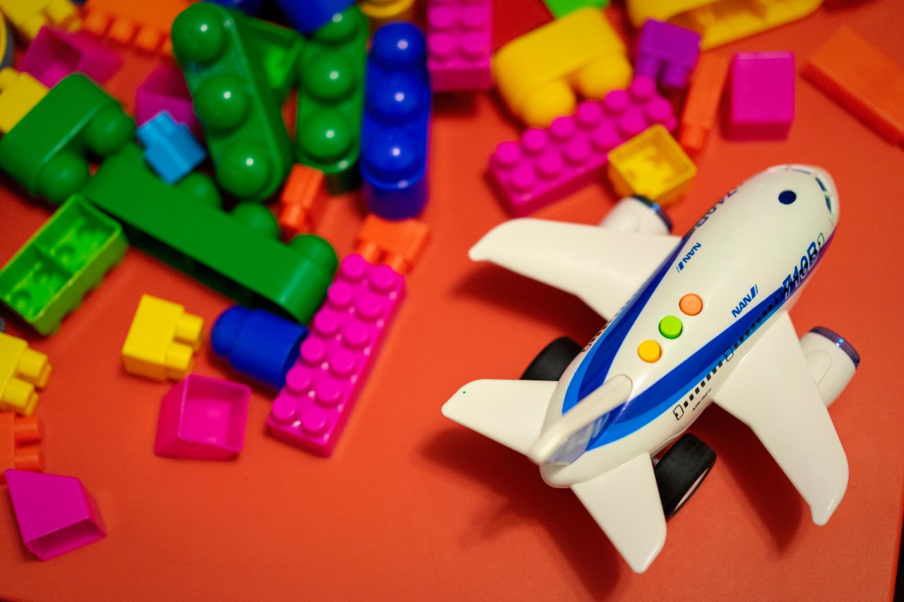 Colorful toy bricks and toy plane