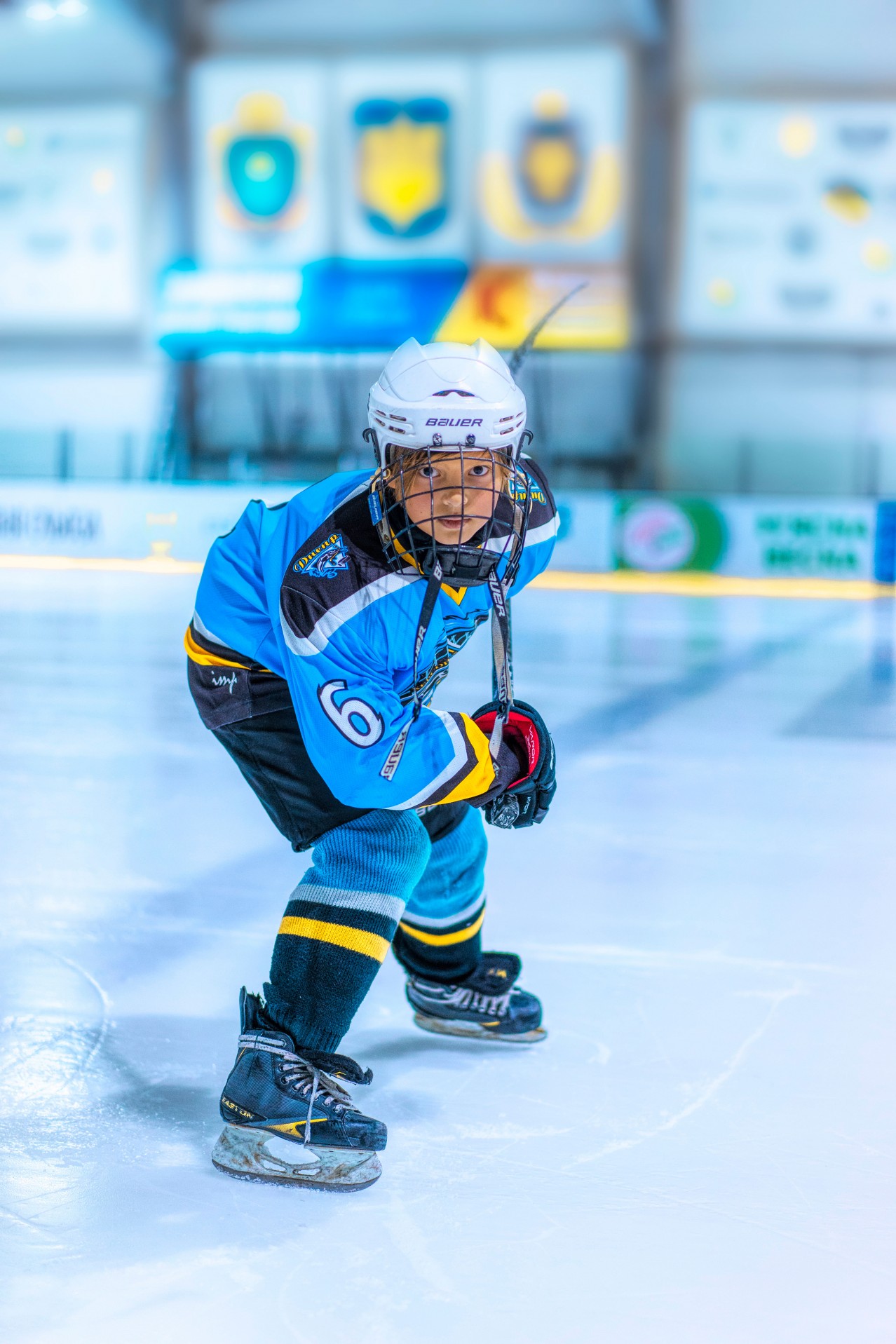 Hockey Player in Special Clothes on Ice-rink