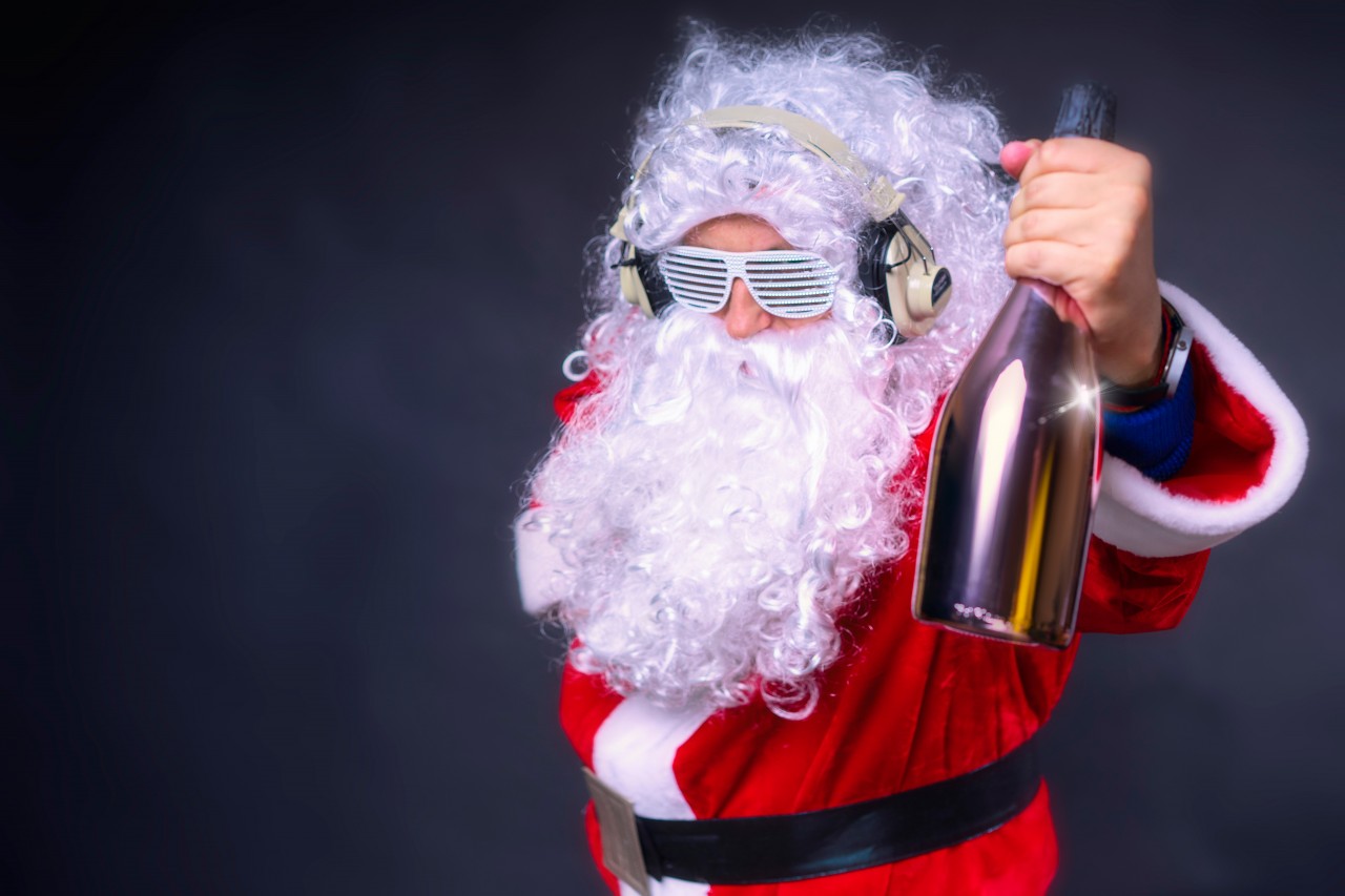 Santa Claus with champagne bottle