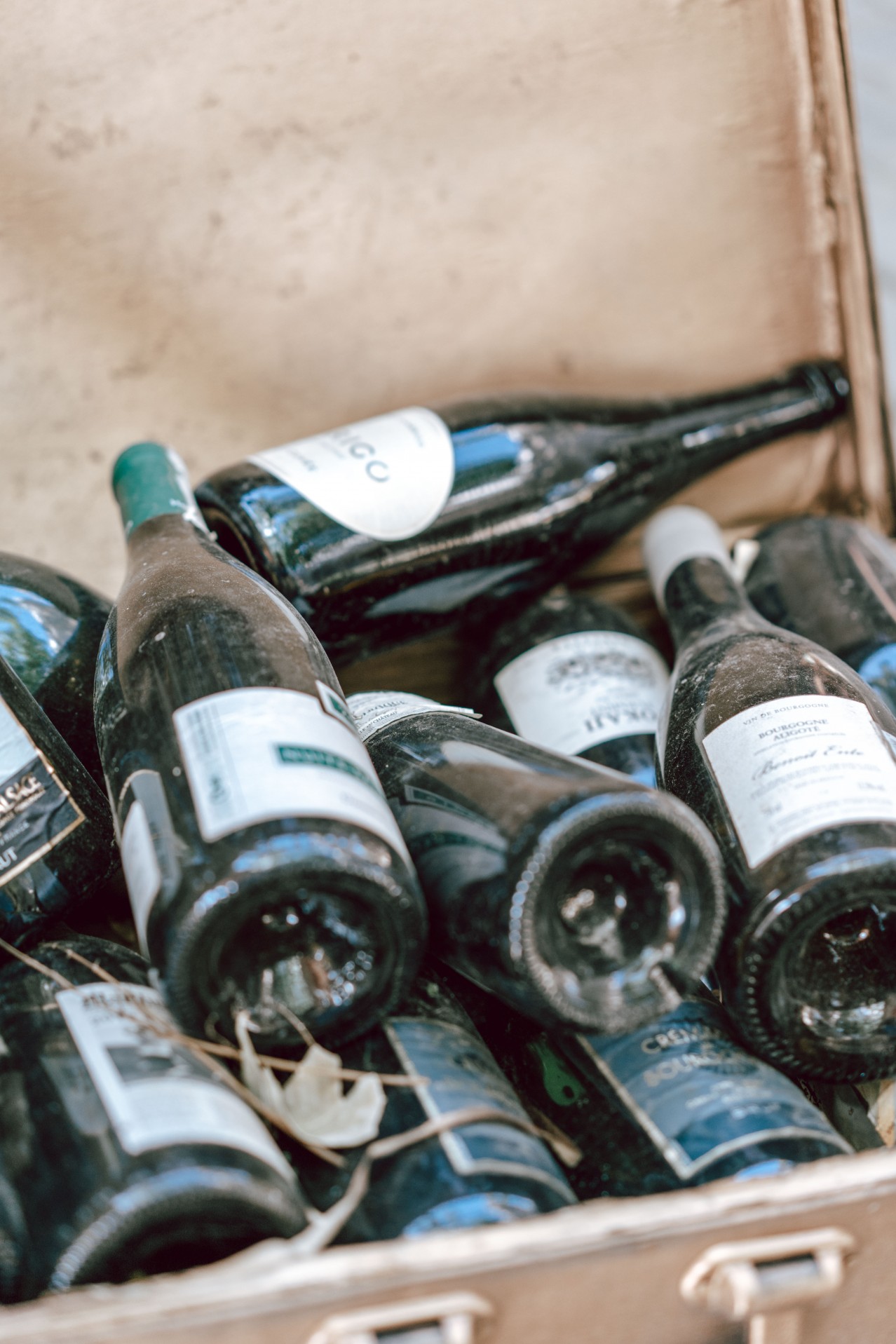 Old wine bottles in the suitcase