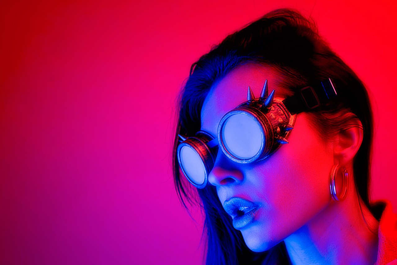 Attractive brunette girl in steampunk goggles