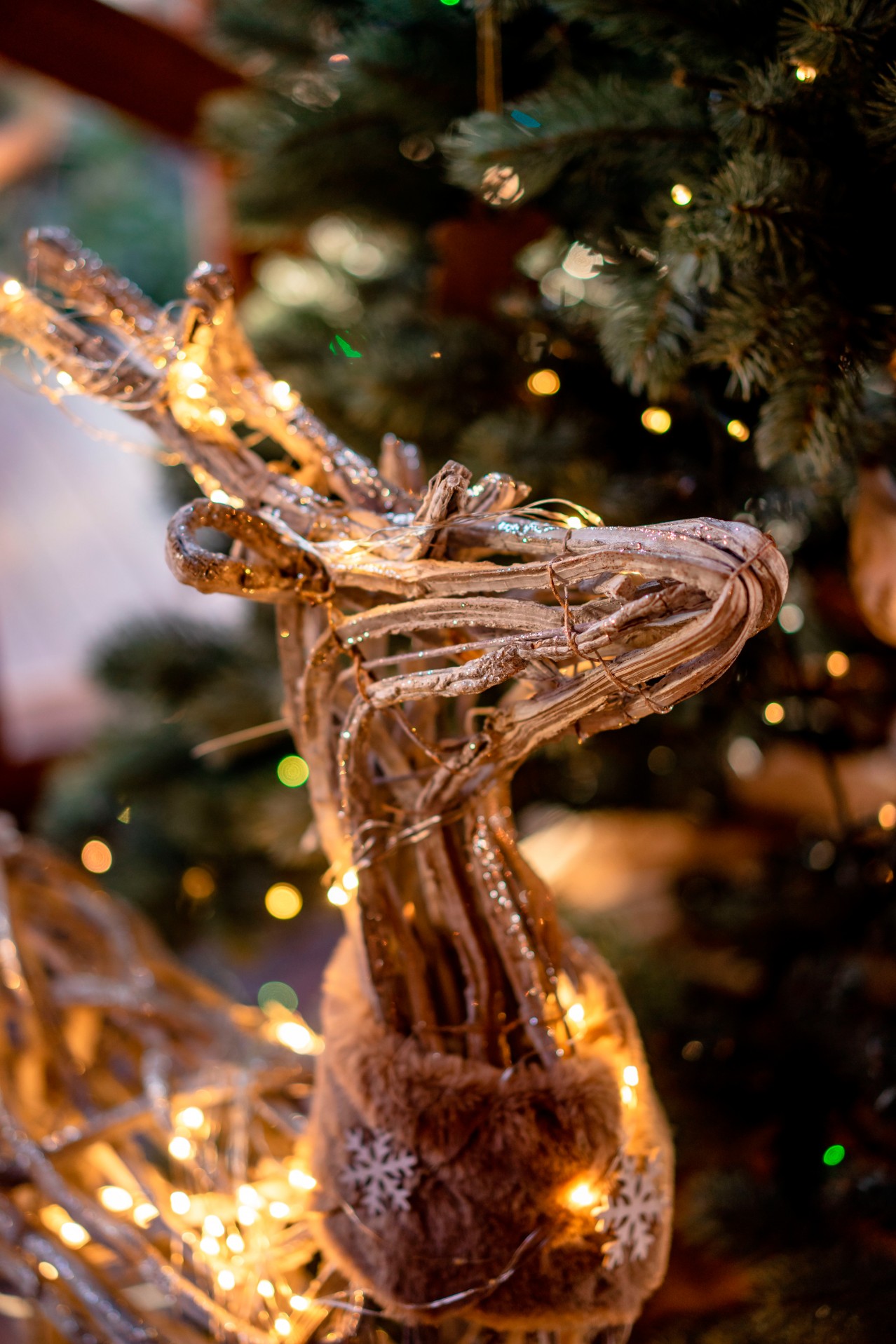 Decorative wooden deer with Christmas lights