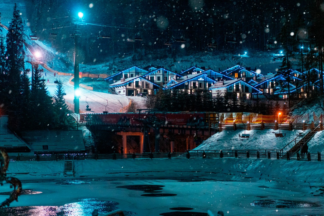 Scenic view of a winter city decorated with Christmas lights